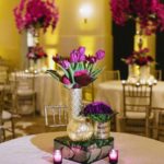 29 Wedding-Flowers-Tulips-Coxcomb-And-Orchids-In-Mercury-Glass-Vases