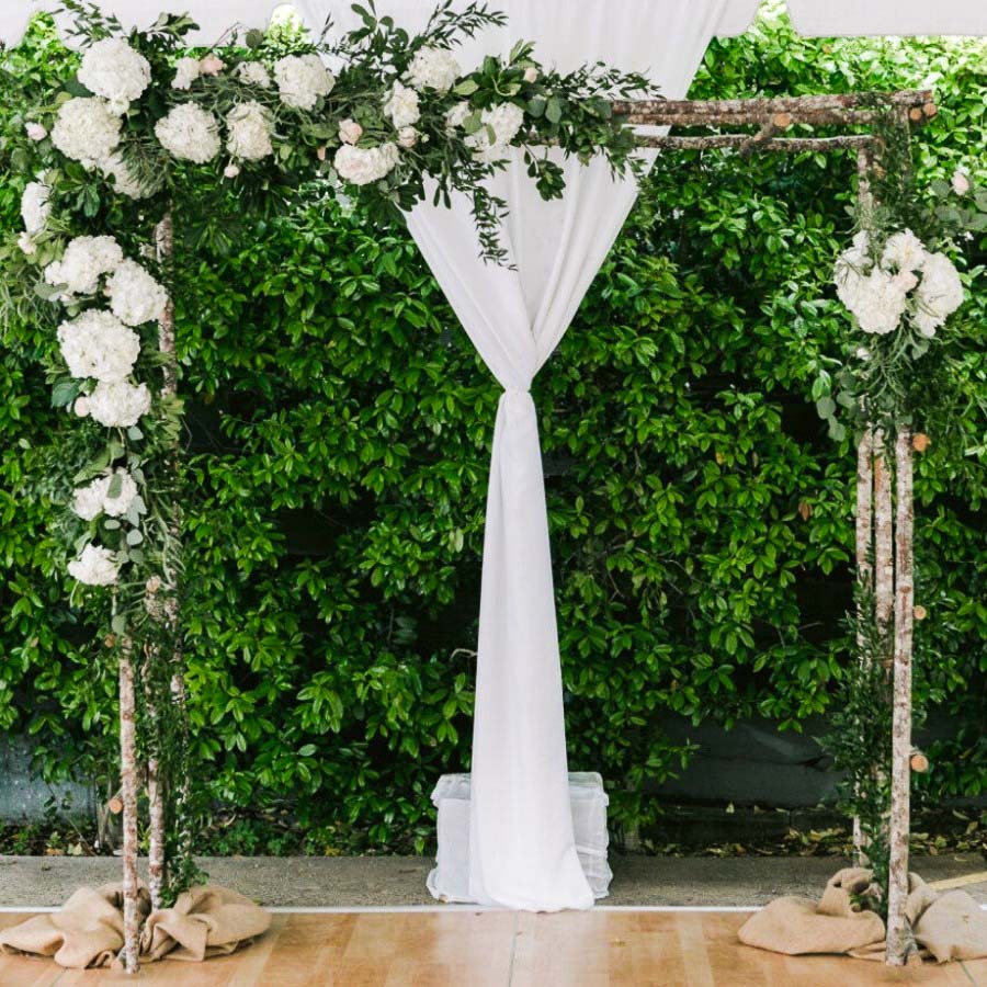 Birch Backdrop Accented With Florals