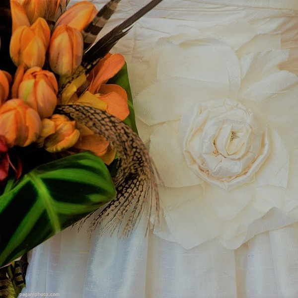 Bold Orange Tulip Bouquet With Brown Pheasant Feathers