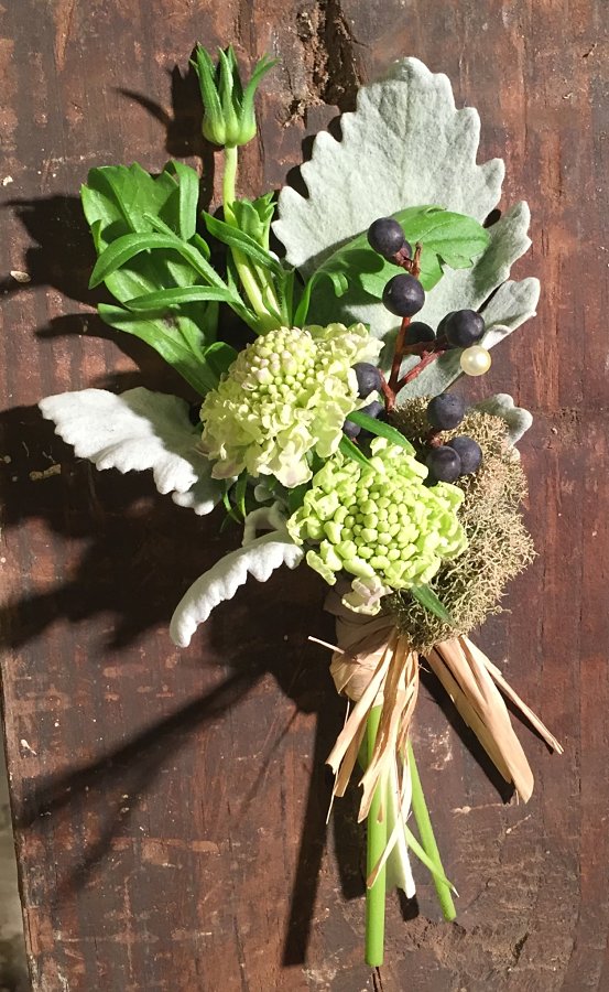 Grey Dusty Miller Foliage, Green Flowers & Black Privet Berry Boutonniere