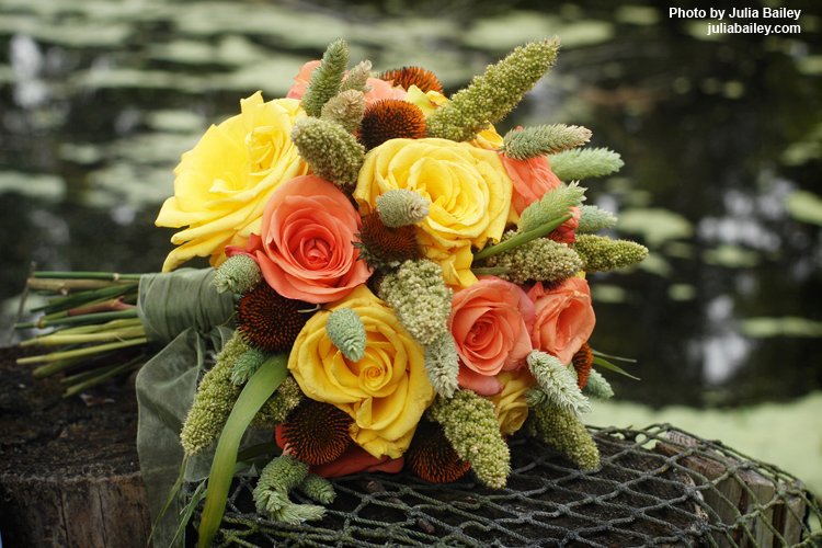 Wheat, Millet And Coneflower Pods With Orange And Yellow Roses Fall Bouquet