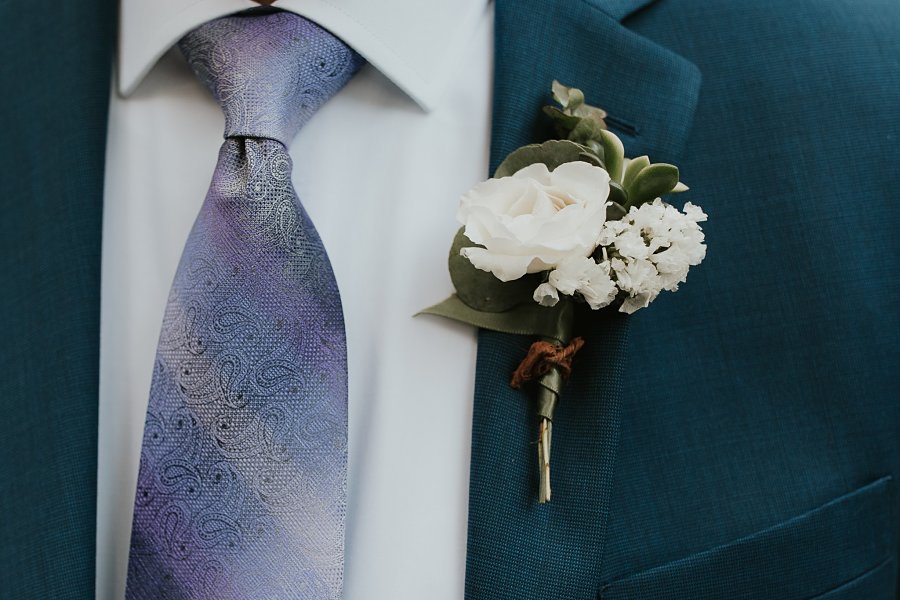 Succulent & White Flower Boutonniere With Bark Wire Detail Succulent & White Flower Boutonniere With Bark Wire Detail