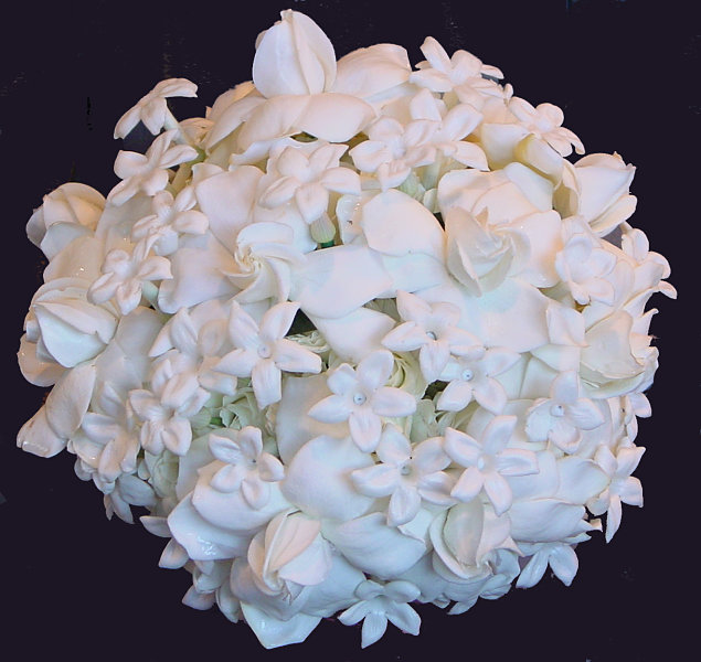 White Round Fragrant Bouquet Of Stephanotis Blossoms And Mini Gardenias